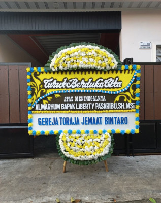 Papan Bunga Duka di Bilah Hulu